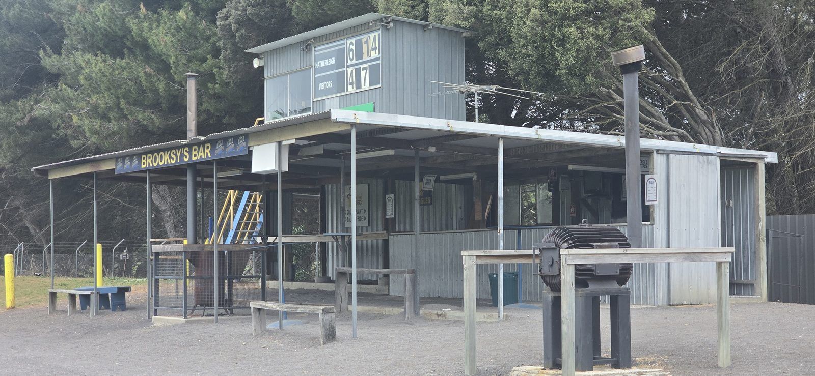 Brooksy's Bar and the can hill, with the scoreboard