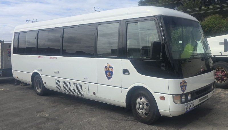 The Eagles Express community bus with the Hatherleigh club logo on the side and front
