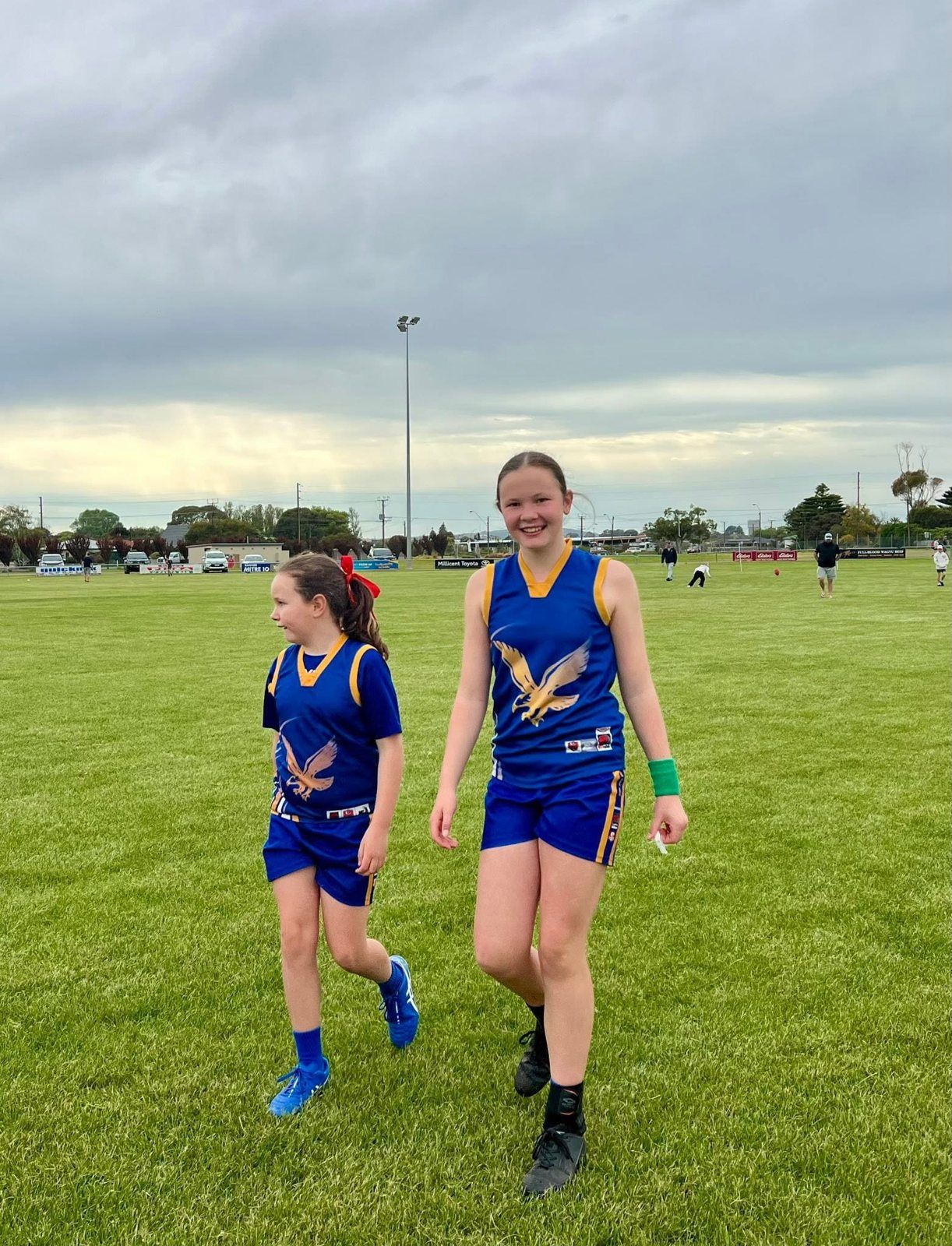 Two Hatherleigh girls walk off the ground