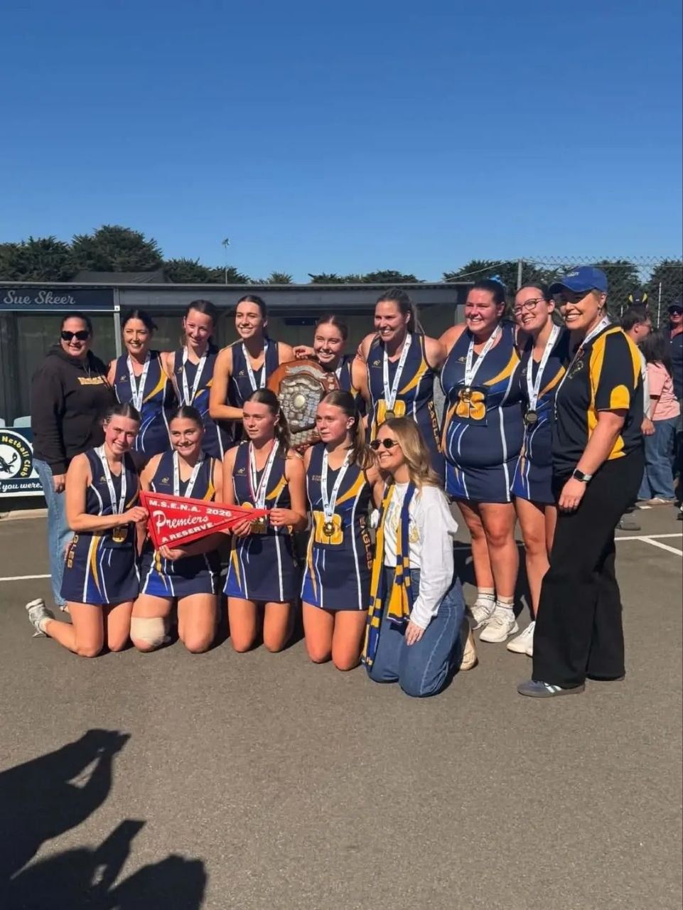 Hatherleigh A Reserve netball team celebrate the 2026 MSENA premiership with the shield and pennant