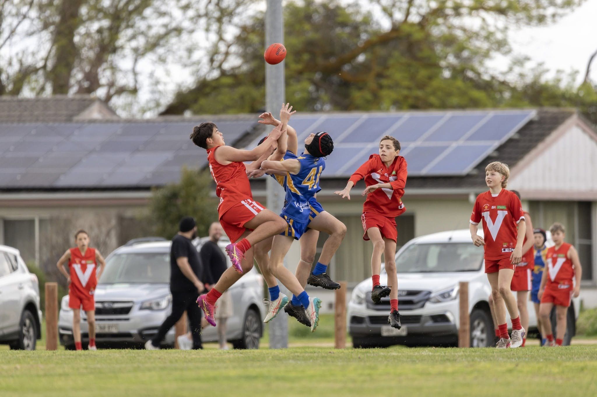 Hatherleigh and Tantanoola Junior Colts players fly for the ball