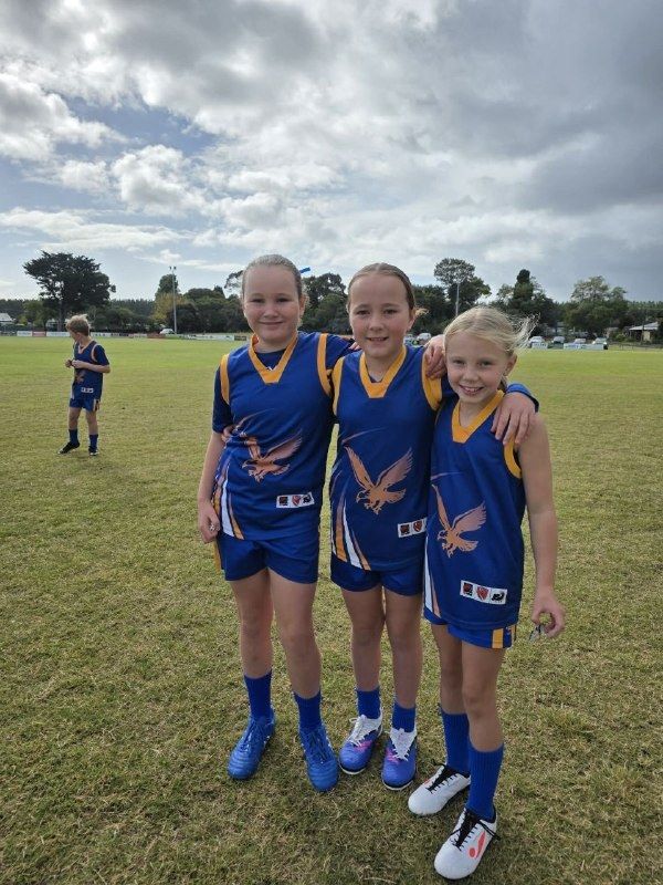 Three cousins in Hatherleigh jumpers after an U11 football game