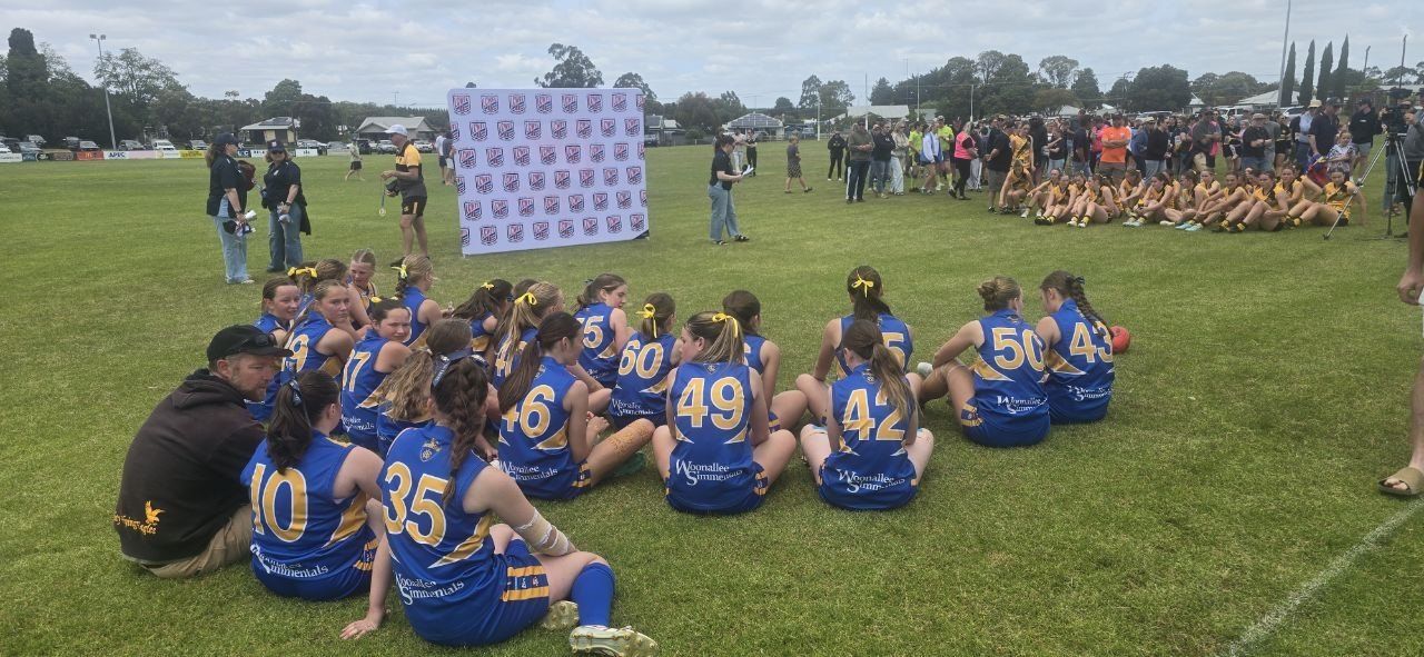 Hatherleigh U16 Girls wait for the 2025 grand final presentation
